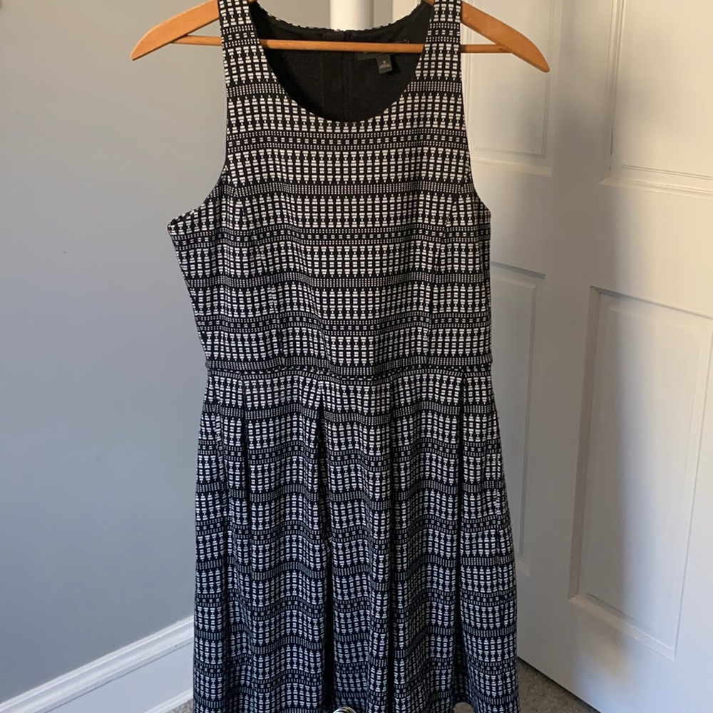 Black Dress with white design.